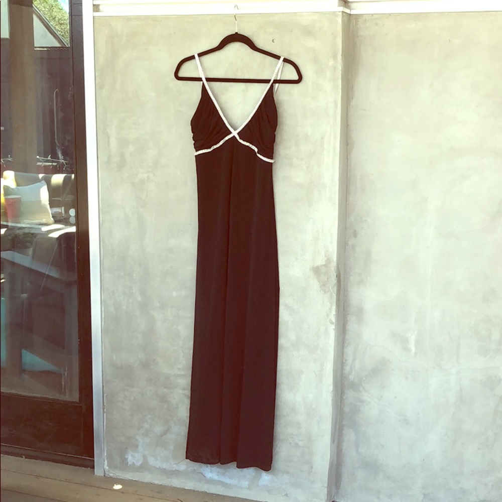 Timeless glamorous black dress. Size M